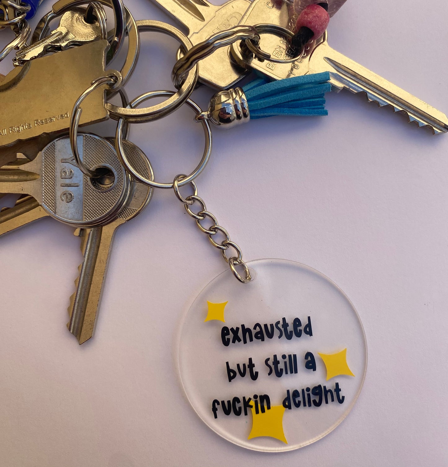'EXHAUSTED DELIGHT' Acrylic Keyring With Tassel